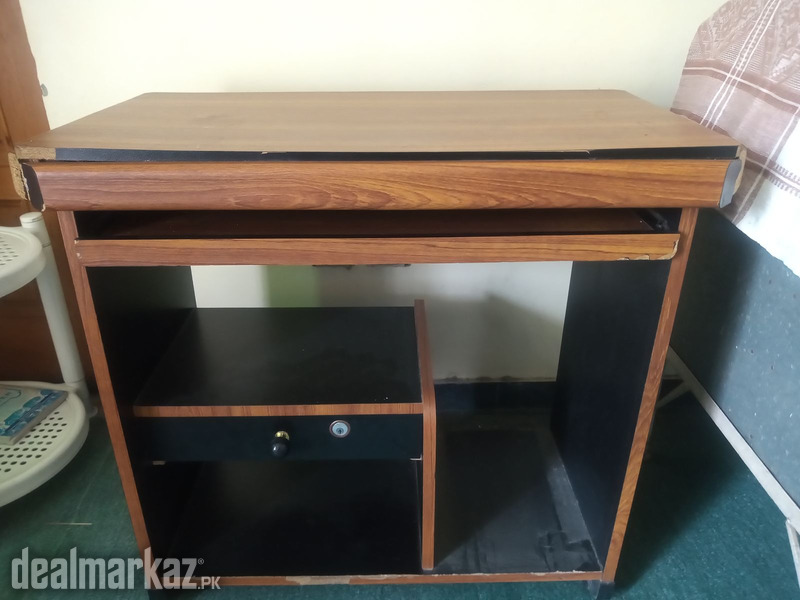 A Wooden Computer table in good condition is available for sale